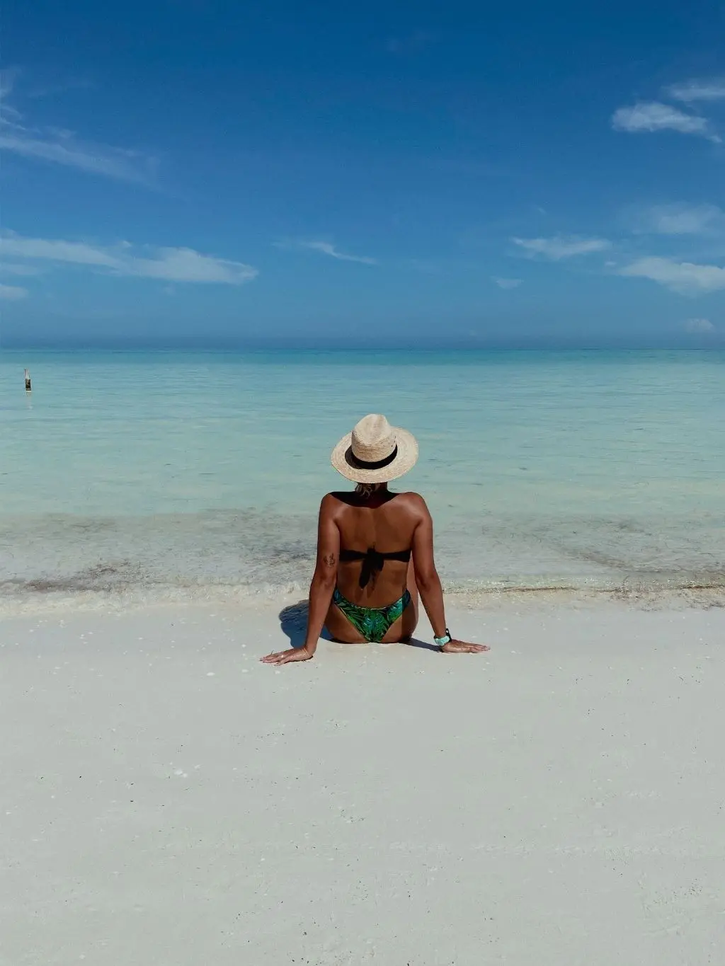 Photo of a woman in the beautiful beach in Holbox Island